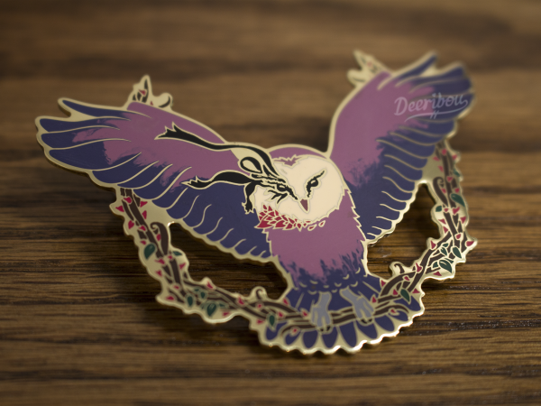 Pin of Down the Rabbit Hole, Designed by Deeribou, it is an owl with it's wings spread perched on a wreath of rose thorns